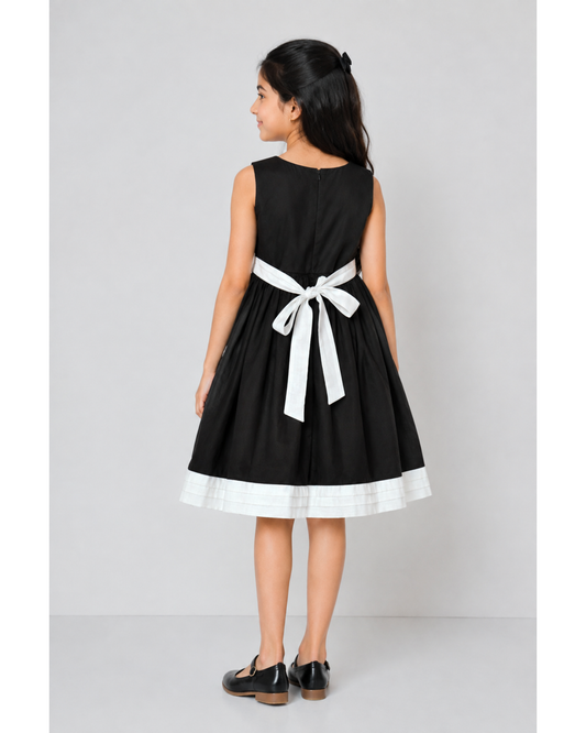 Black dress with White stripes at waist and bottom hemline