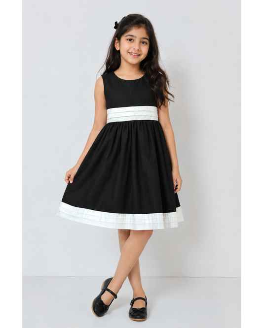 Black dress with White stripes at waist and bottom hemline
