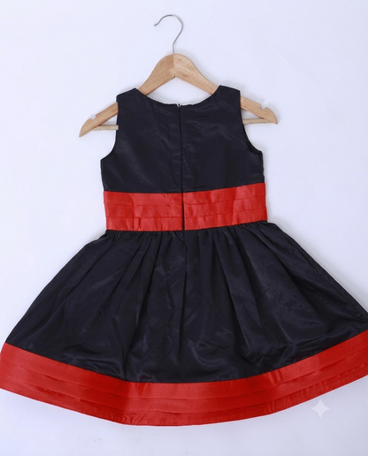 Knee length satin frock with red belt