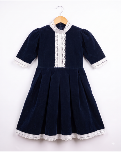 Box pleated velvet frock with stand collar and lace