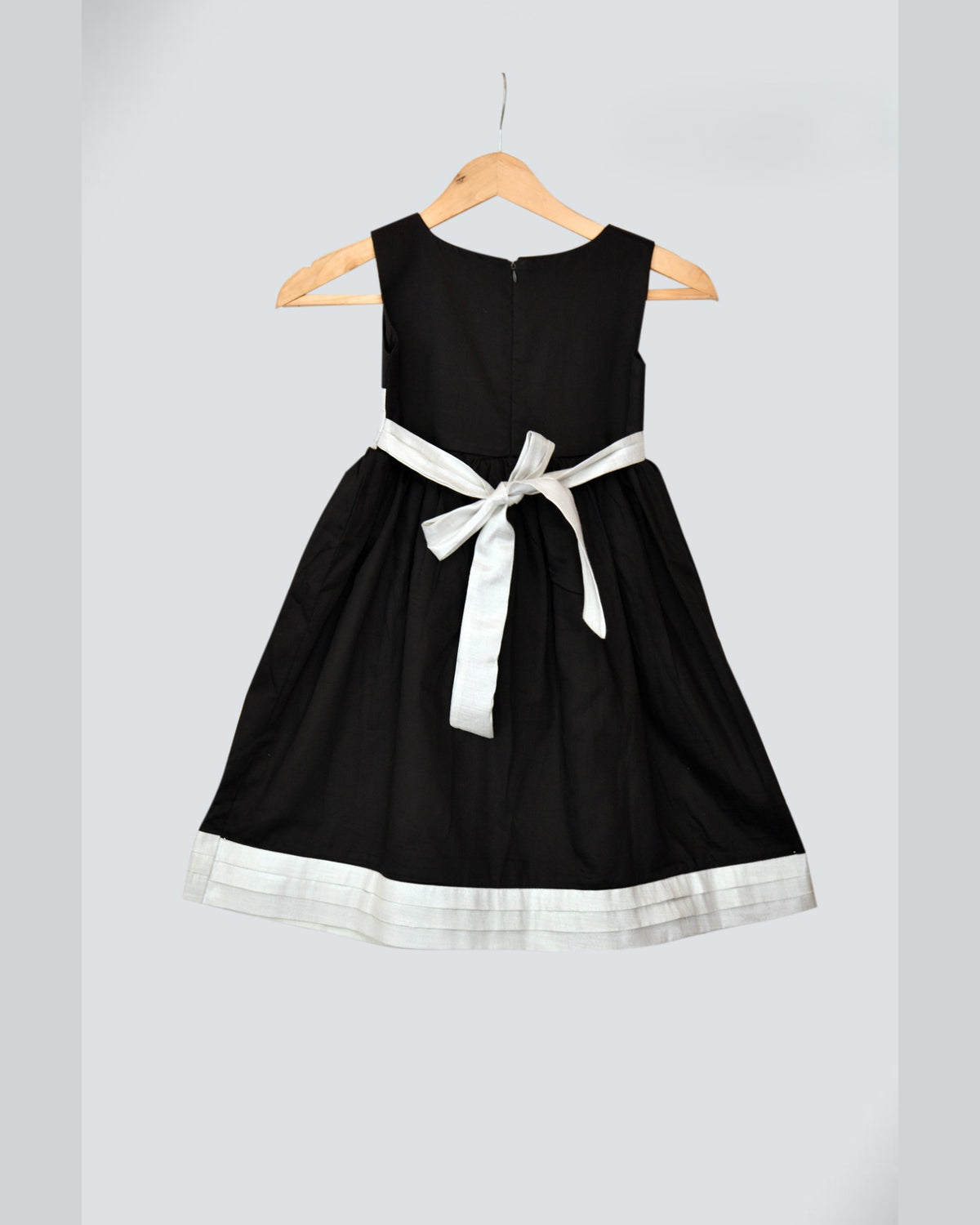 Black dress with White stripes at waist and bottom hemline