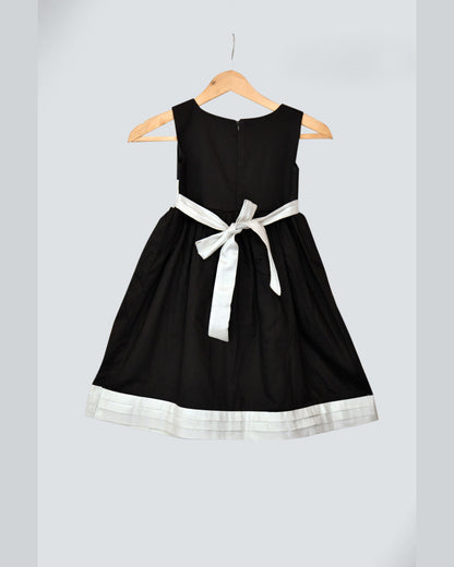 Black dress with White stripes at waist and bottom hemline