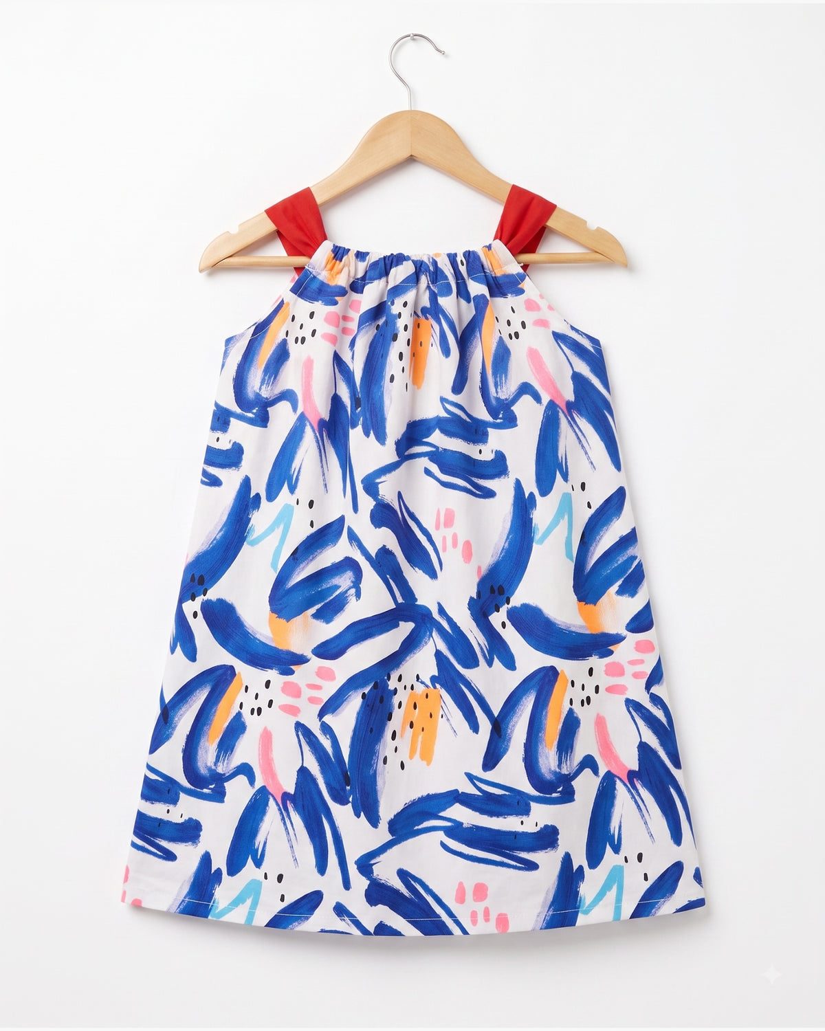 Pillowcase dress with red bow tie