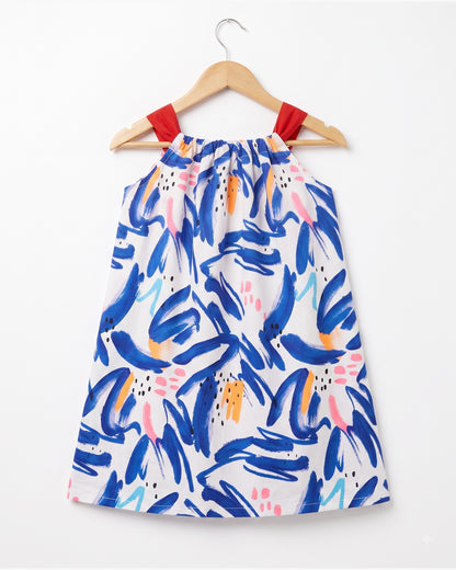 Pillowcase dress with red bow tie
